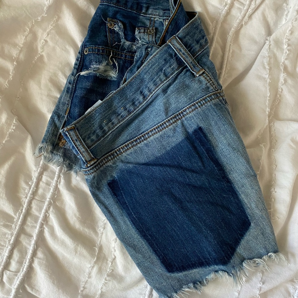 ripped mulicolored statement pocket jean shorts